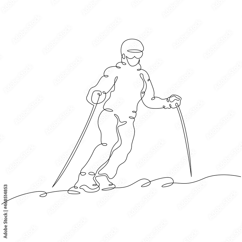 Alpine skier rides along a snowy slope. The athlete goes downhill skiing. Winter sports. Alpine skier.