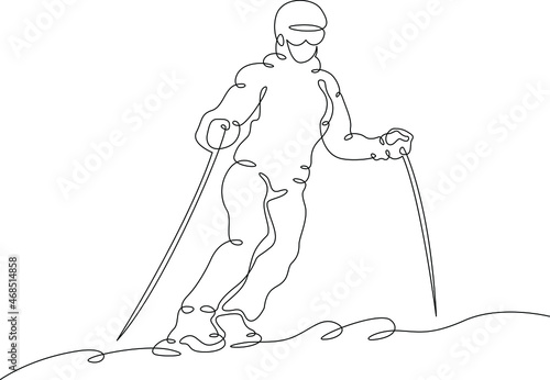 Alpine skier rides along a snowy slope. The athlete goes downhill skiing. Winter sports. Alpine skier.One continuous line .One continuous drawing line logo isolated minimal illustration.