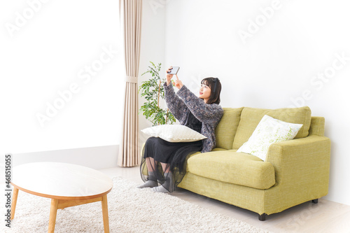 Young vloger streaming her content photo