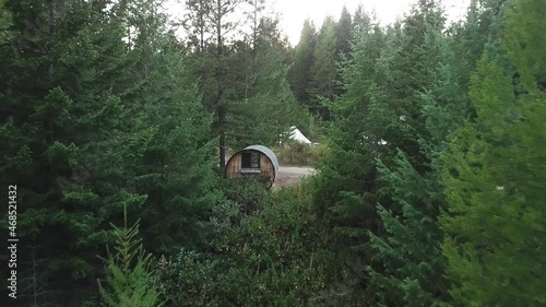 Drone fly over barrel cabin and Yurt camp site. photo