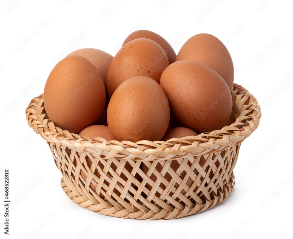 Eggs in basket isolated on white background Eggs in basket isolated on white background