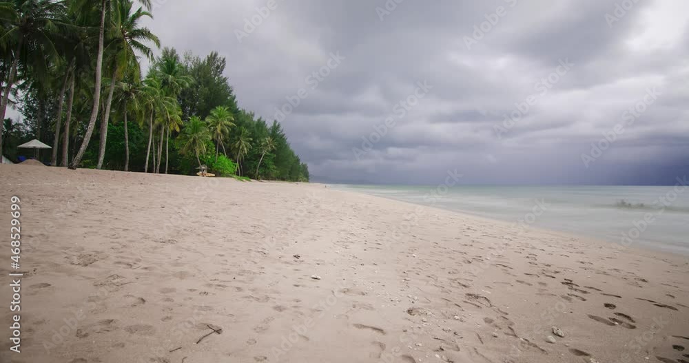 timelapse the beach with white sand and wave from peaceful sea in sunshine daytime timelapse the beach with white sand and wave from peaceful sea in sunshine daytime