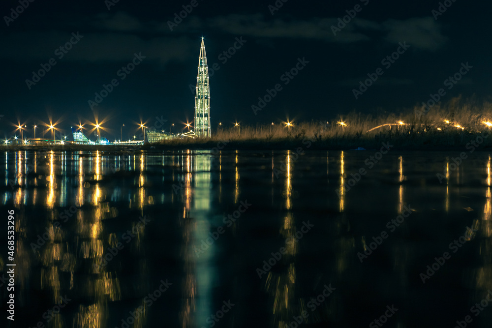 Fototapeta premium Modern skyscraper in the night