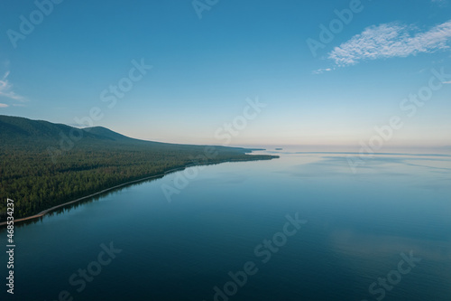 Summertime imagery of Lake Baikal in morning is a rift lake located in southern Siberia  Russia. Baikal lake summer landscape view. Drone s Eye View.