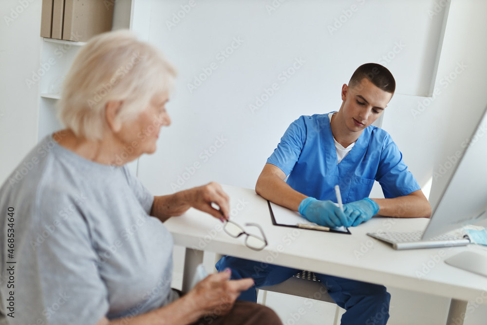 an elderly woman at a doctor's appointment a visit to the hospital an elderly woman at a doctor's appointment a visit to the hospital
