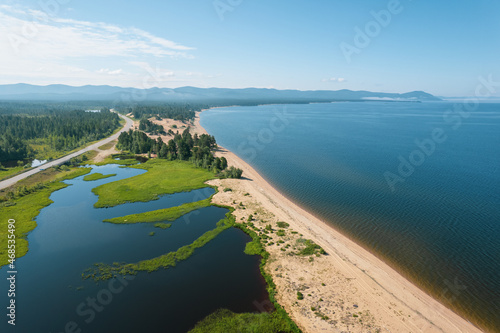 Summertime imagery of Lake Baikal is a rift lake located in southern Siberia, Russia. Baikal lake summer landscape view. Drone's Eye View.