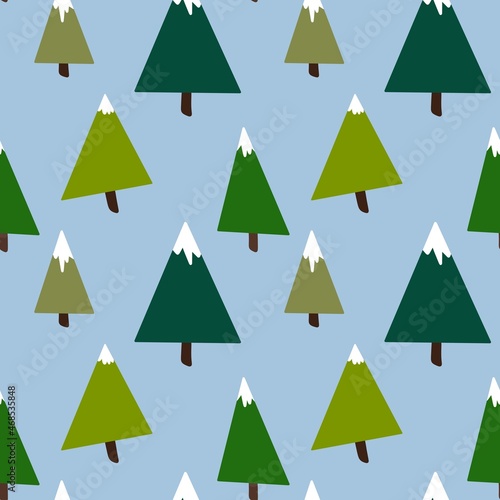 Seamless winter pattern with Christmas trees on blue background for fabrics 
