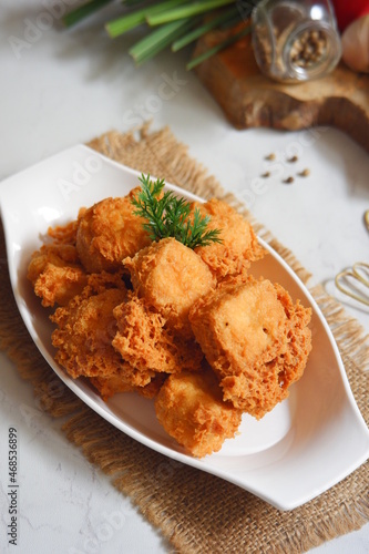 a plate of crispy fried tofu
