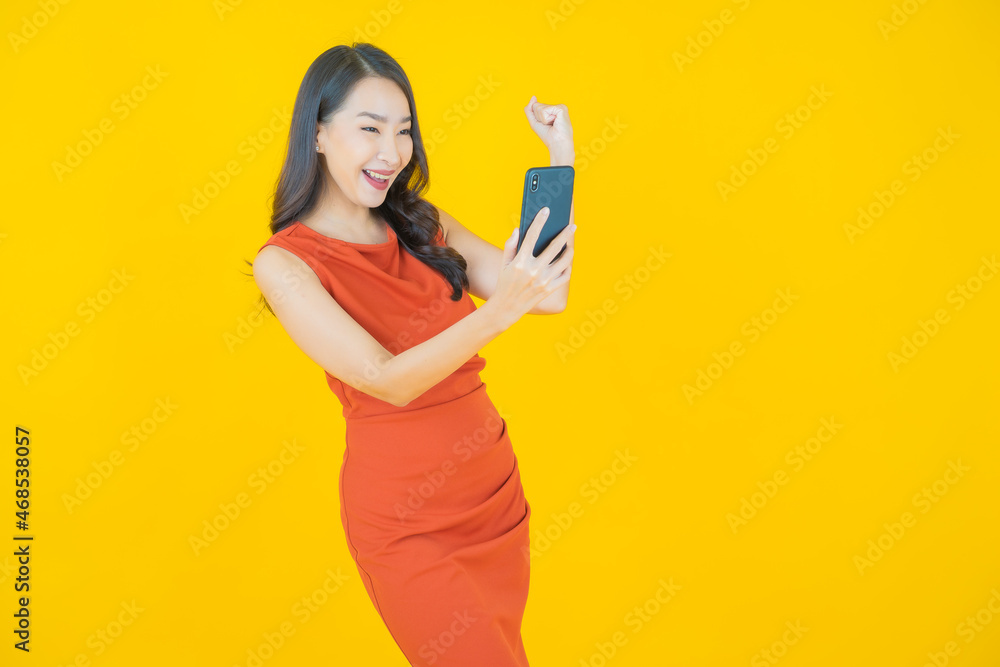 Portrait beautiful young asian woman smile with smart mobile phone Portrait beautiful young asian woman smile with smart mobile phone