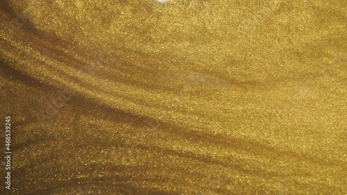 golden liquid background.light sunny yellow gradient.abstract gold liquid wave