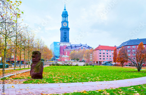 Michelwiese city park and the stone statue of Moai in Hamburg, Germany photo