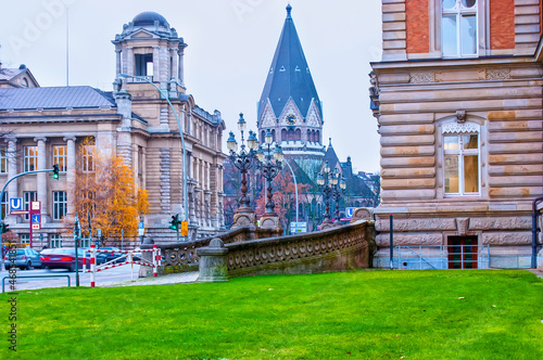 Urban scene on Sievekingplatz with cupola of Church of St. John of Kronstadt on background, Hamburg, Germany photo