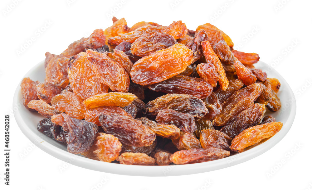 Golden dried raisins in white plate isolated on white background. Golden dried raisins in white plate isolated on white background.