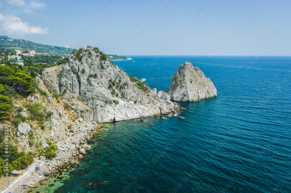 Aerial view of Rock Diva. Beautiful black sea shore landscape with mountain cliff, main nature landmark in Crimean Simeiz on vacation