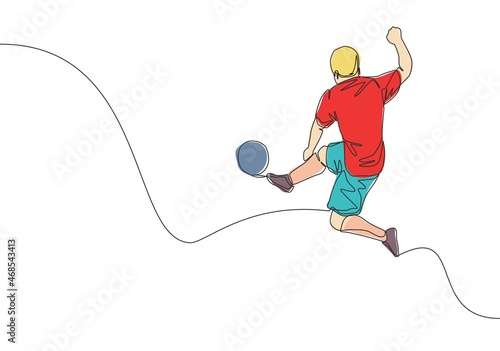 One continuous line drawing of young energetic football attacker kicking the ball really hard to the goal. Soccer match sports concept. Single line draw design vector illustration
