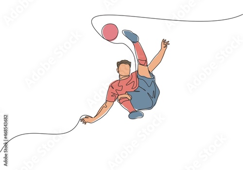 Single continuous line drawing of young talented football player shooting the ball with bicycle kick technique. Soccer match sports concept. One line draw design vector illustration photo