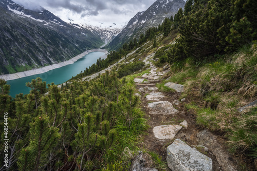 Beautiful view of Schlegeis Stausee on mountain hiking path trail. Zillertal  Austria  Europe