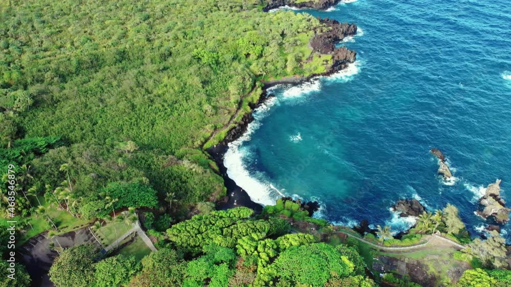 Aerial top down of lighting blue water of Pacific Ocean at Black sand beach in Maui,Hawaii Aerial top down of lighting blue water of Pacific Ocean at Black sand beach in Maui,Hawaii