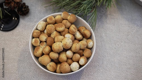 A bowl of kuciukai on the table, a traditional Lithuanian food for Christmas Eve celebration  photo