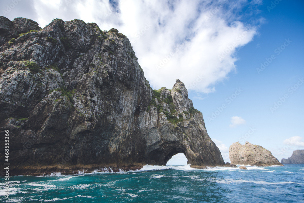 cave in the sea, bay of islands, new zealand
