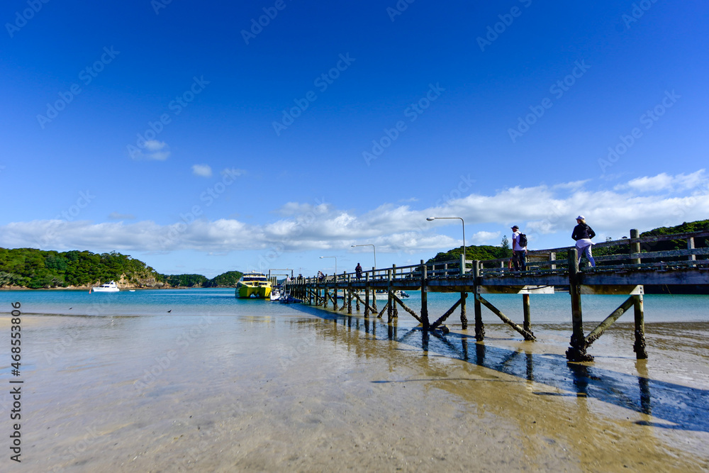 pier on the beach, bay of islands, new zealand