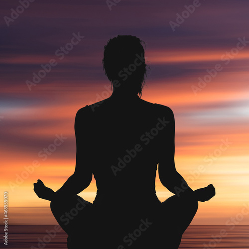 Meditation Silhouette with sunset background