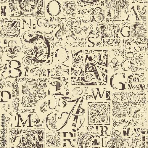 Vector seamless pattern with hand-drawn initial and capital letters on a beige backdrop. Repeating background with alphabet letters in grunge style. Suitable for wallpaper  wrapping paper  fabric