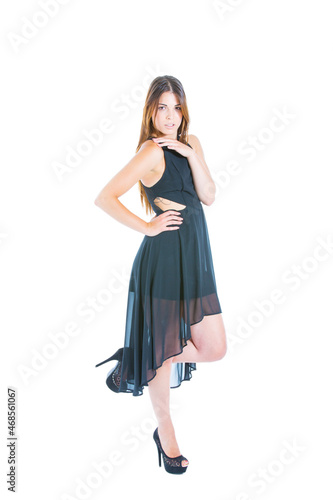 Studio shot of a beautiful young woman in black dress