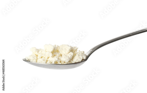 Delicious fresh cottage cheese in spoon isolated on white