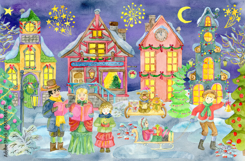Greeting card with Christmas carolers and playing children in sledges, with beautiful vintage houses at night. photo