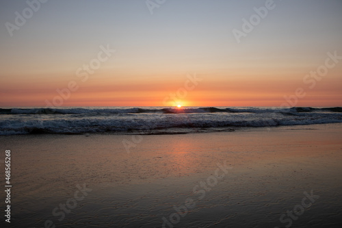 Beautiful orange Sunset at the Beach in El Palmar Andalucia Spain at the Costa de la Luz