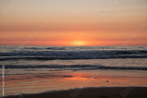 Fototapeta Naklejka Na Ścianę i Meble -  Beautiful orange Sunset at the Beach in El Palmar Andalucia Spain at the Costa de la Luz