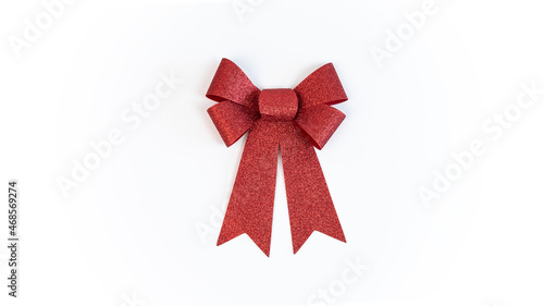 Beautiful red bow gift christmas decoration isolated on white background. Xmas