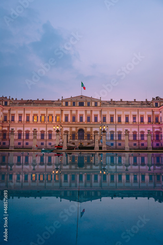 The Royal Villa of Monza, a neoclassical style building illuminated at sunrise