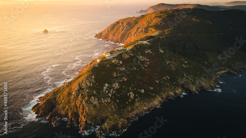 Cape fisterre the end of the earth for the ancient tradition, aerial view of rock cliff formation over Atlantic Ocean sea in Galicia autonomous region of north Spain Cabo fisterra photo