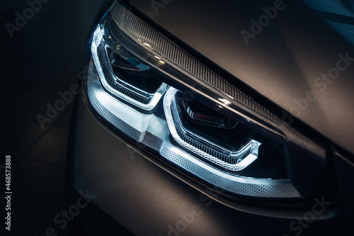 Led headlight of modern luxury car at night