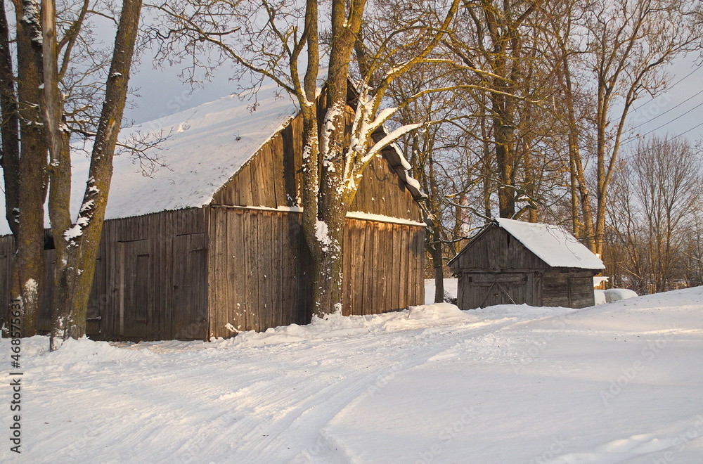An old wooden shed on a sunny winter day. An old wooden shed on a sunny winter day.