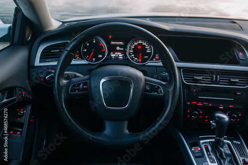 Modern car interior with the leather panel, and dashboard © Moose