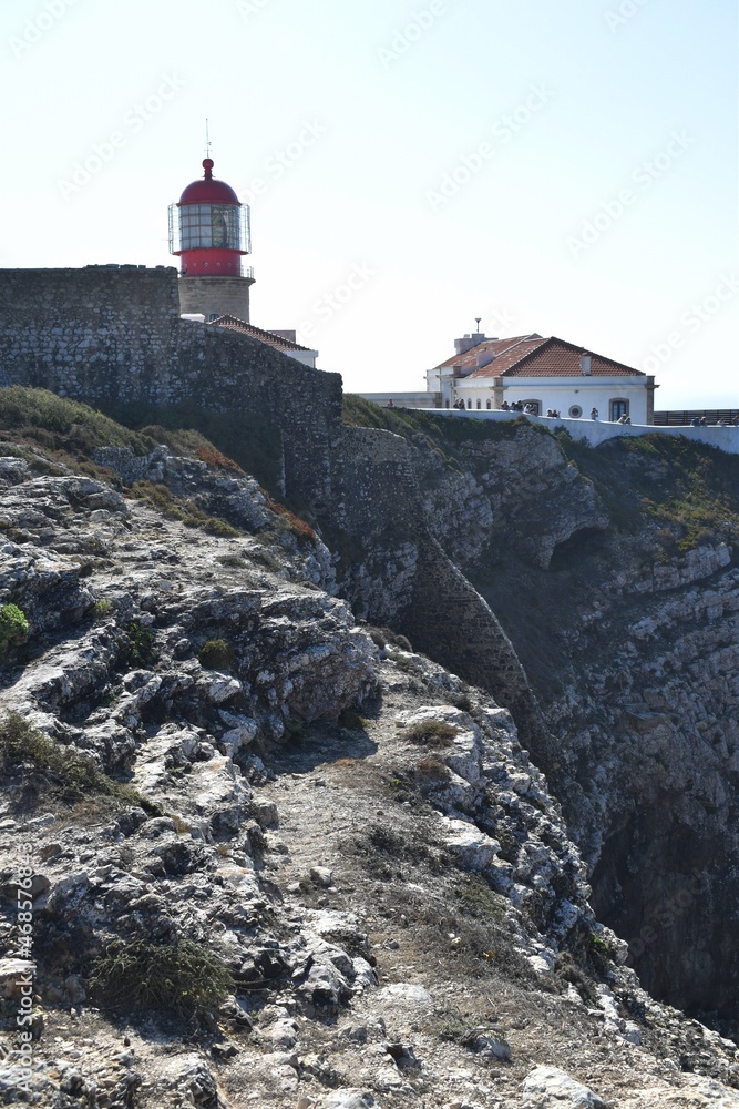 The lighthouse of Cabo de San Vicente and unidentified tourists looking at the landscape