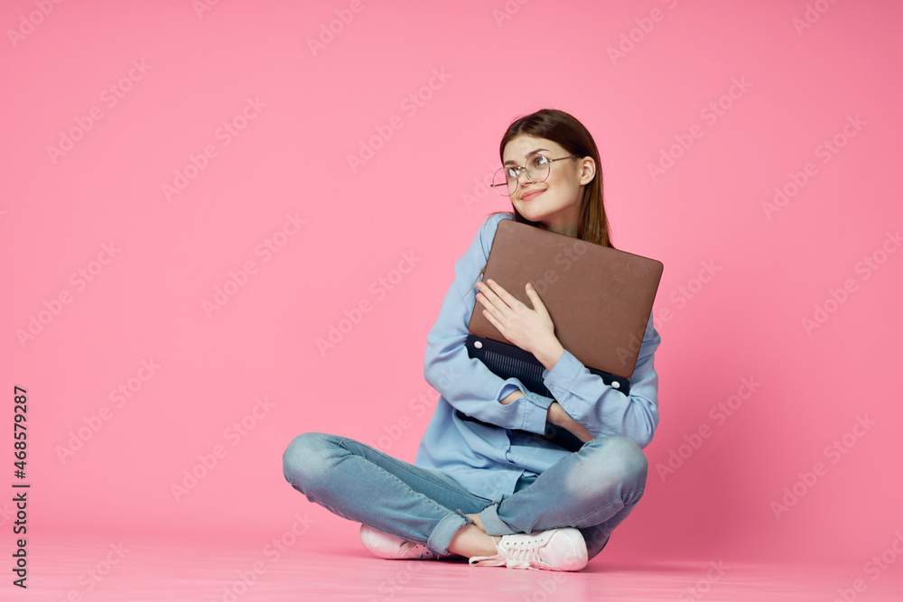 woman with laptop sitting on floor technology internet shopping pink background woman with laptop sitting on floor technology internet shopping pink background