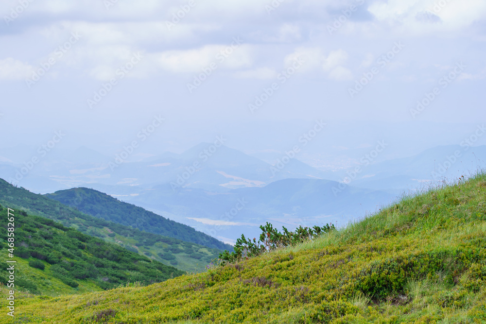 misty mountain tops in Slovenia national park misty mountain tops in Slovenia national park
