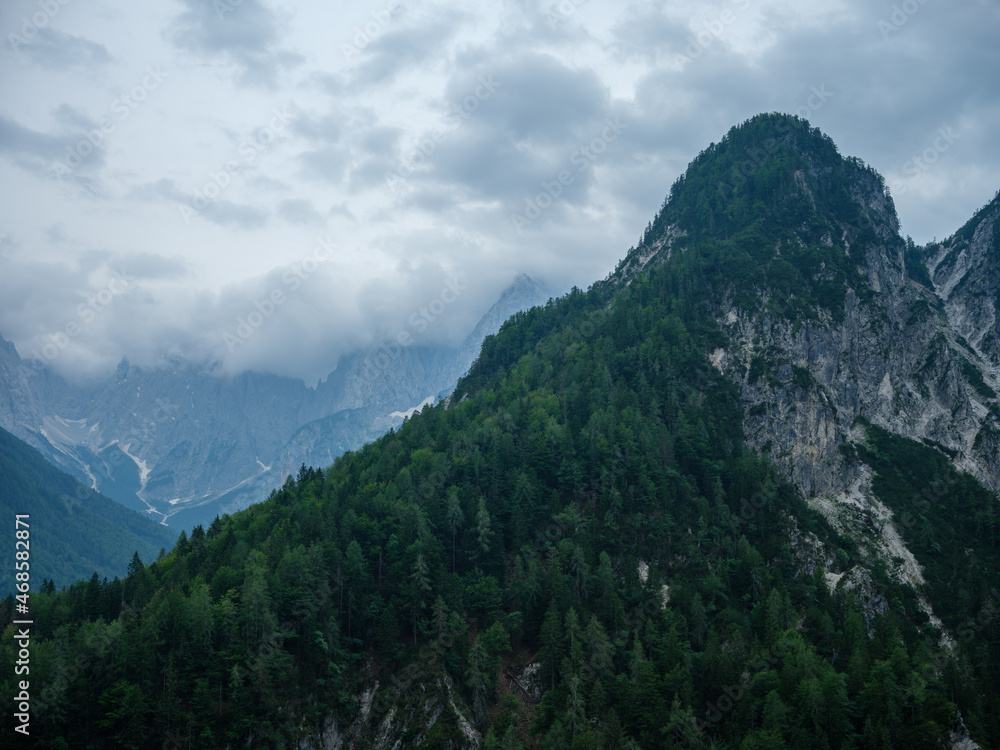 Fototapeta premium misty mountain tops in Slovenia national park