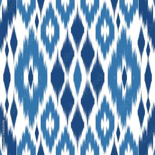 Tribal Art ikat Ogee in traditional classic blue and white colors Seamless pattern. Fabric print