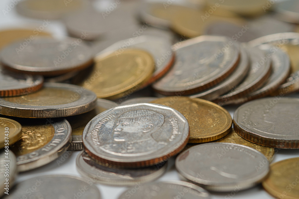 money coins to stack of coins.Saving money for future use concept and money financial business growth concept. isolated on white background money coins to stack of coins.Saving money for future use concept and money financial business growth concept. isolated on white background