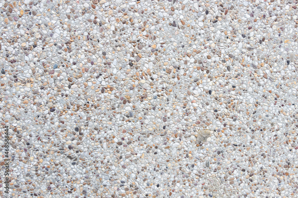 Stone wall made of pebbles for texture Stone wall made of pebbles for texture