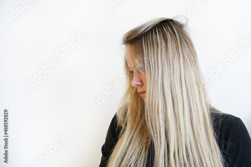 Natural Hair extensions blonde woman on a white background. 