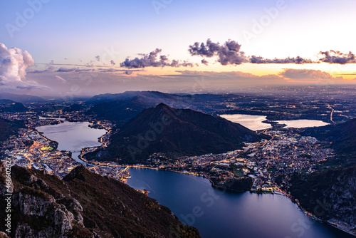 The city of Lecco  on Lake Como  photographed after sunset from Pian Dei Resinelli  with Brianza and its lakes in the background.