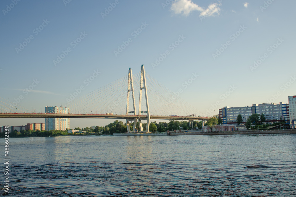 Modern road Vantovyi bridge across the river. Summer travel concept
