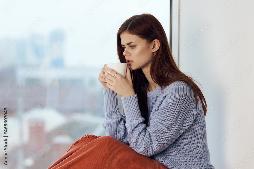 pretty woman dreamy look near window at home rest pretty woman dreamy look near window at home rest