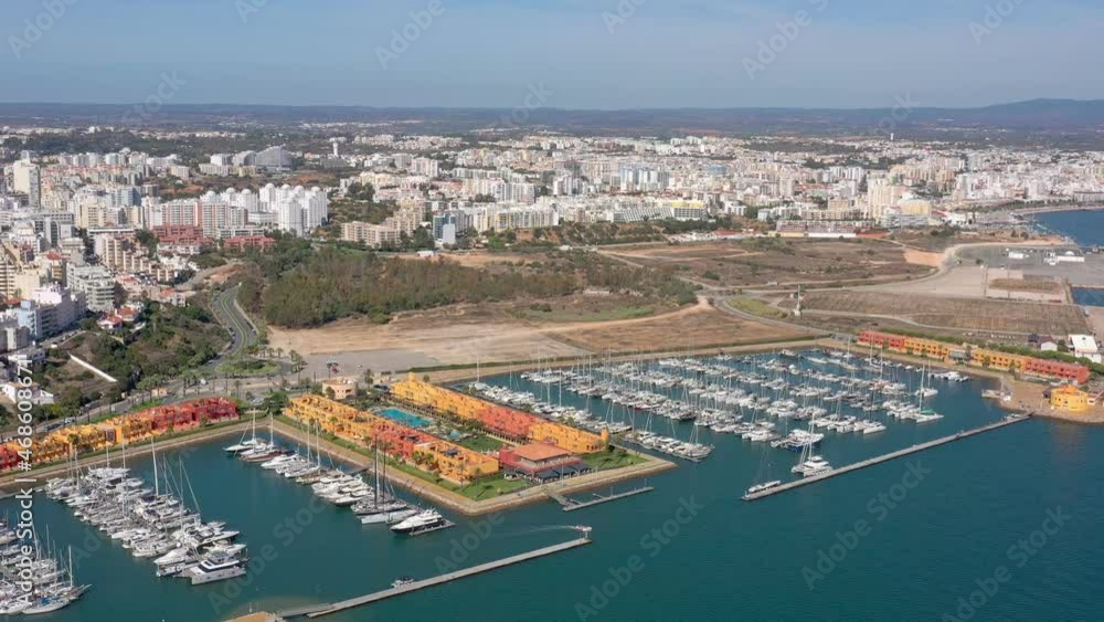Aerial view of the portuguese marina bay, in the tourist town of Portimao, yacht boats of luxury tourists . Aerial view of the portuguese marina bay, in the tourist town of Portimao, yacht boats of luxury tourists .